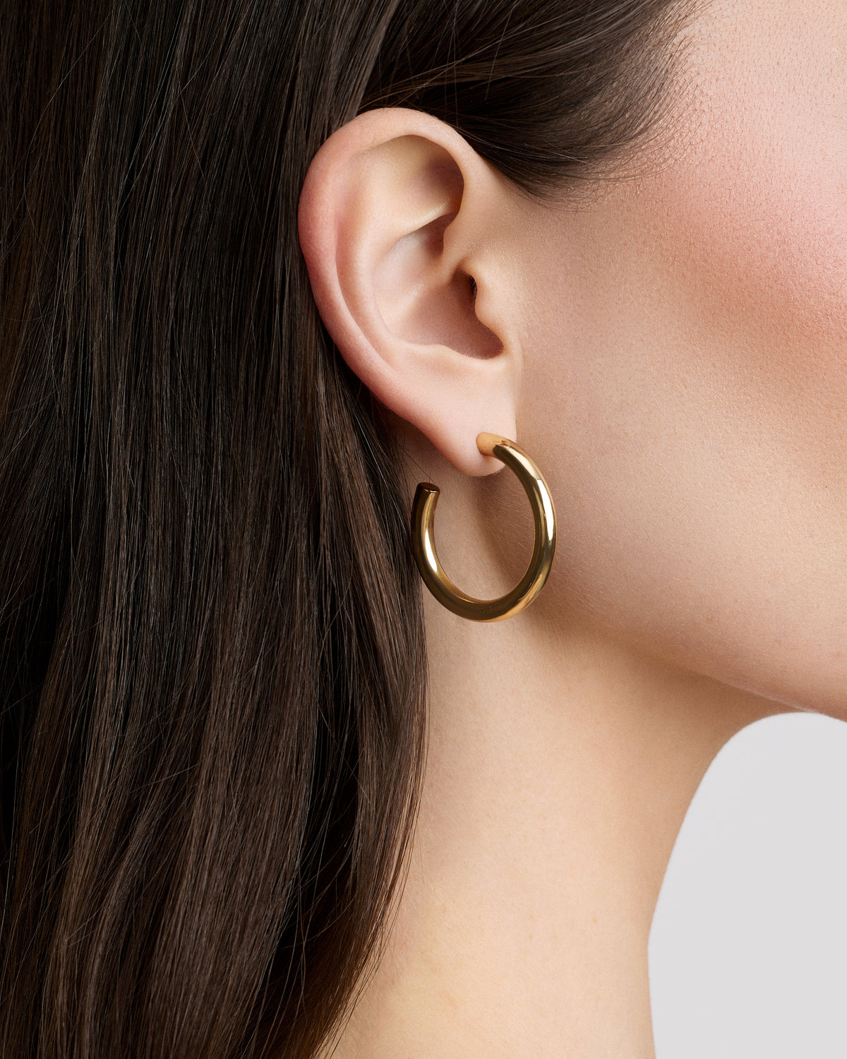 1" Mini Natasha Hoops in 14K Yellow Gold earring - close-up detail | small gold hoop earrings