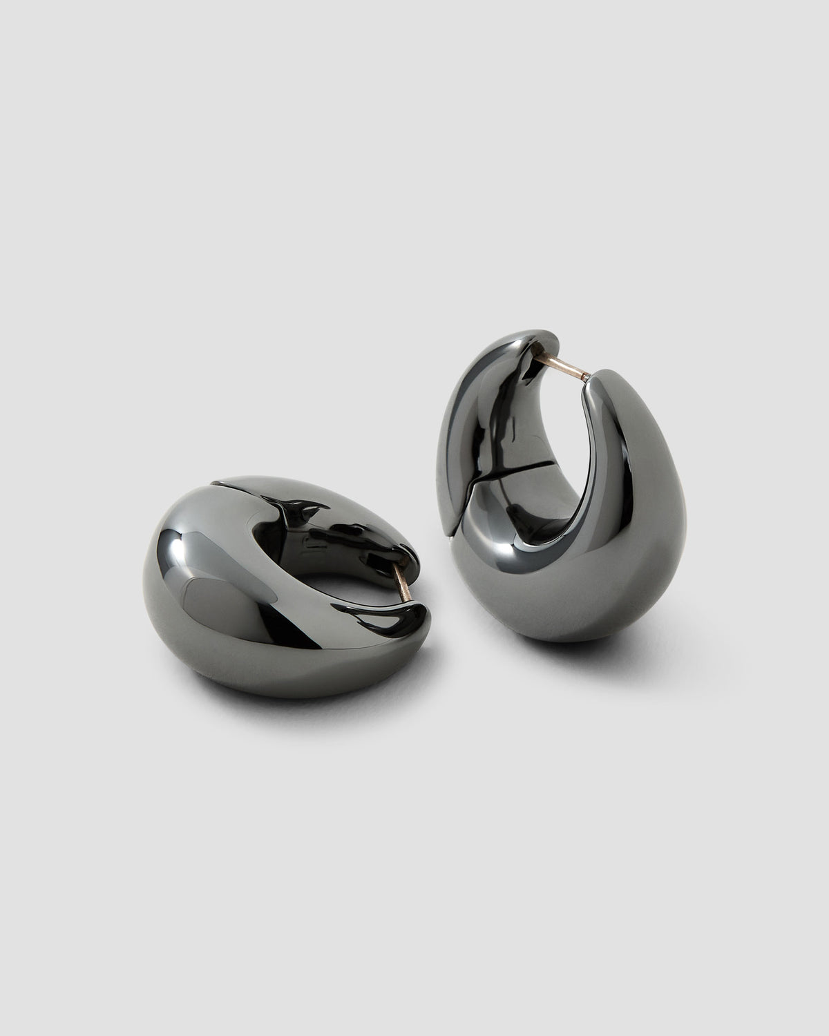 Dylan Micro Huggies earring - alternate angle | gold huggie earrings