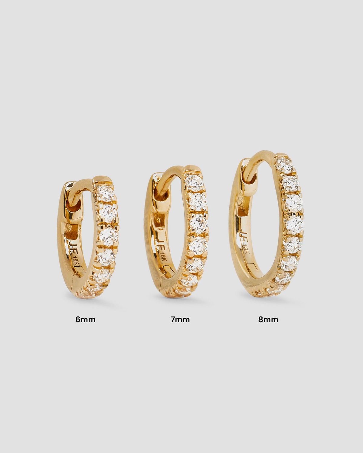 18K Essential Pavé Tiny Huggie gold earring - styled on model | diamond huggie earrings