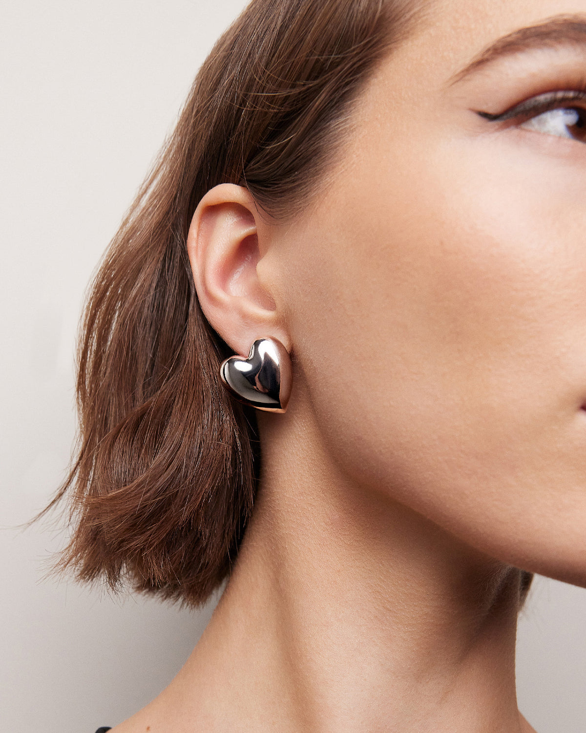 Small Puffy Heart Earrings earring - side view | womens gold earrings
