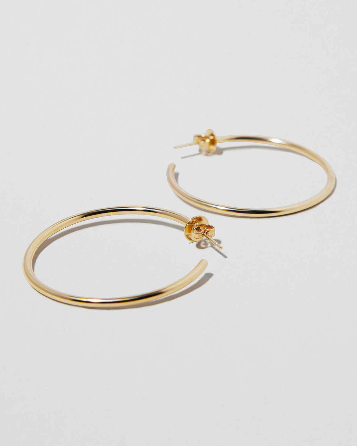 1.5" Thread Hoops in 14K Yellow Gold earring - close-up detail | gold hoop earrings for women
