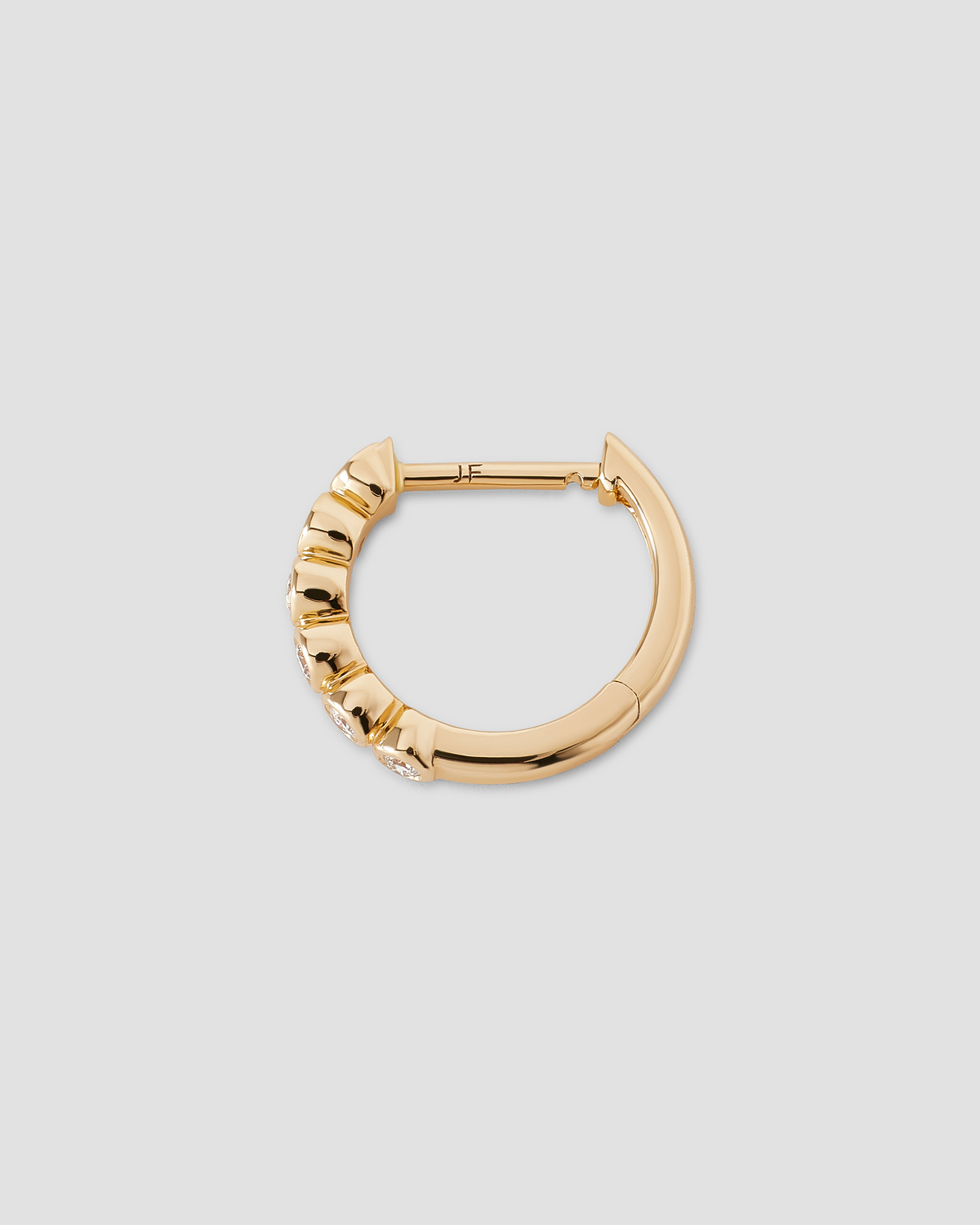 Essential Round Diamond Bezel Huggie gold earring - worn look | diamond huggie earrings
