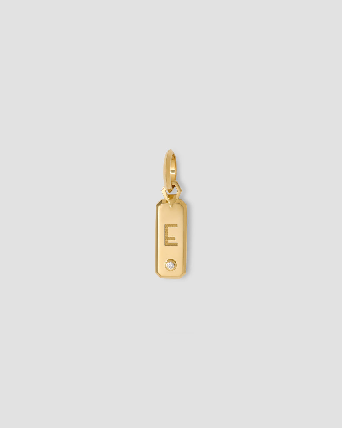 Minimal Block Letter Dog Tag in 18K Yellow gold charm - back view | necklace with charms