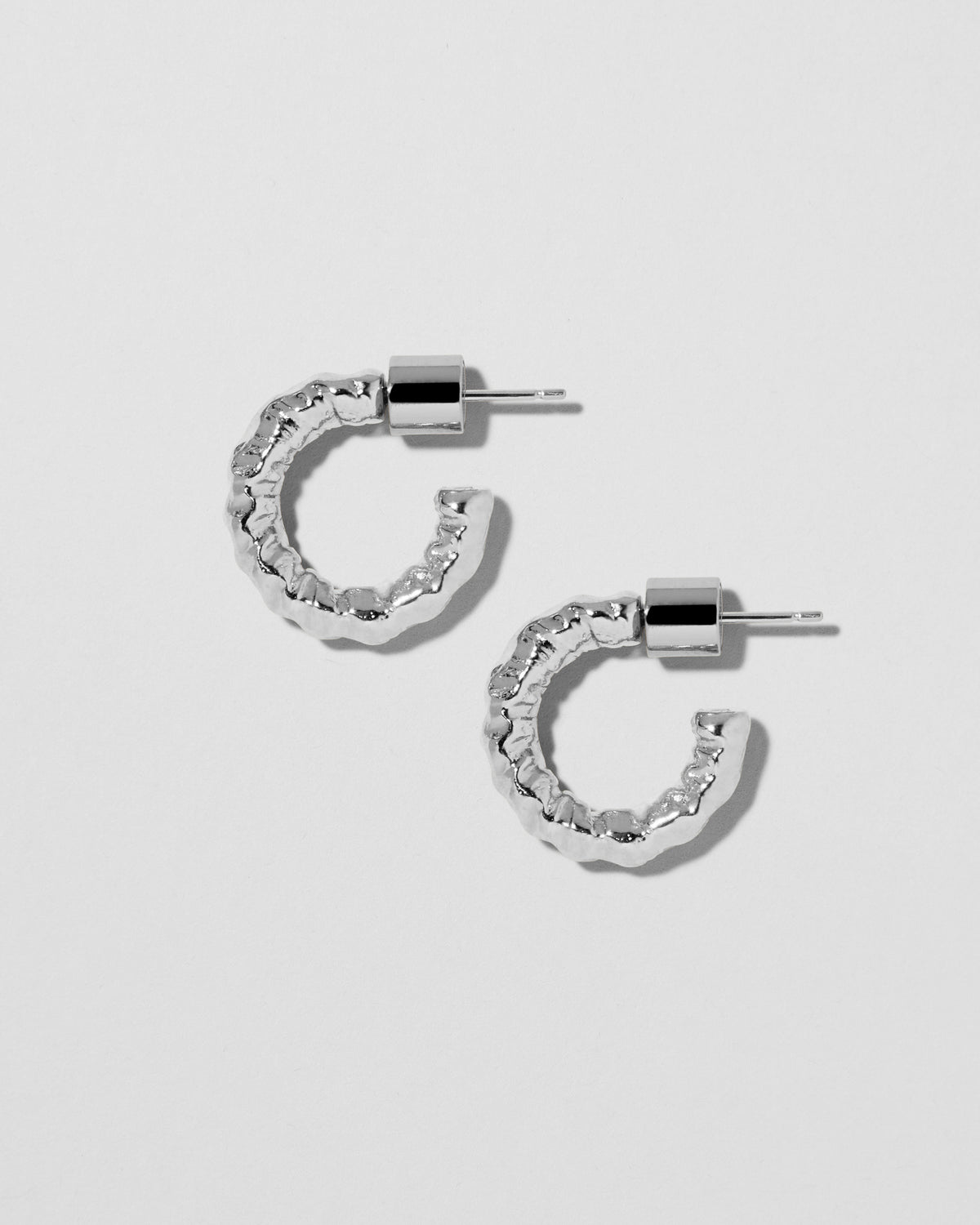 Hailey Micro Huggies earring - alternate angle | gold huggie earrings