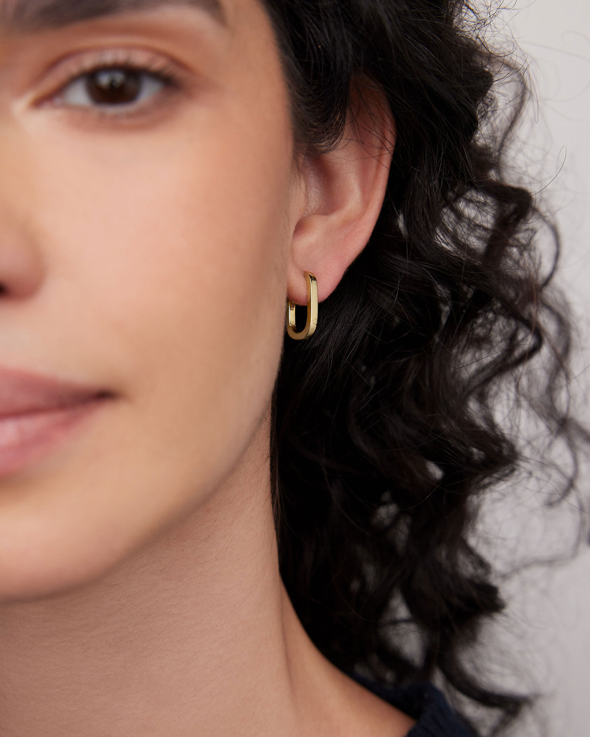 18k Elongated Link Huggie earring - alternate angle | gold huggie earrings