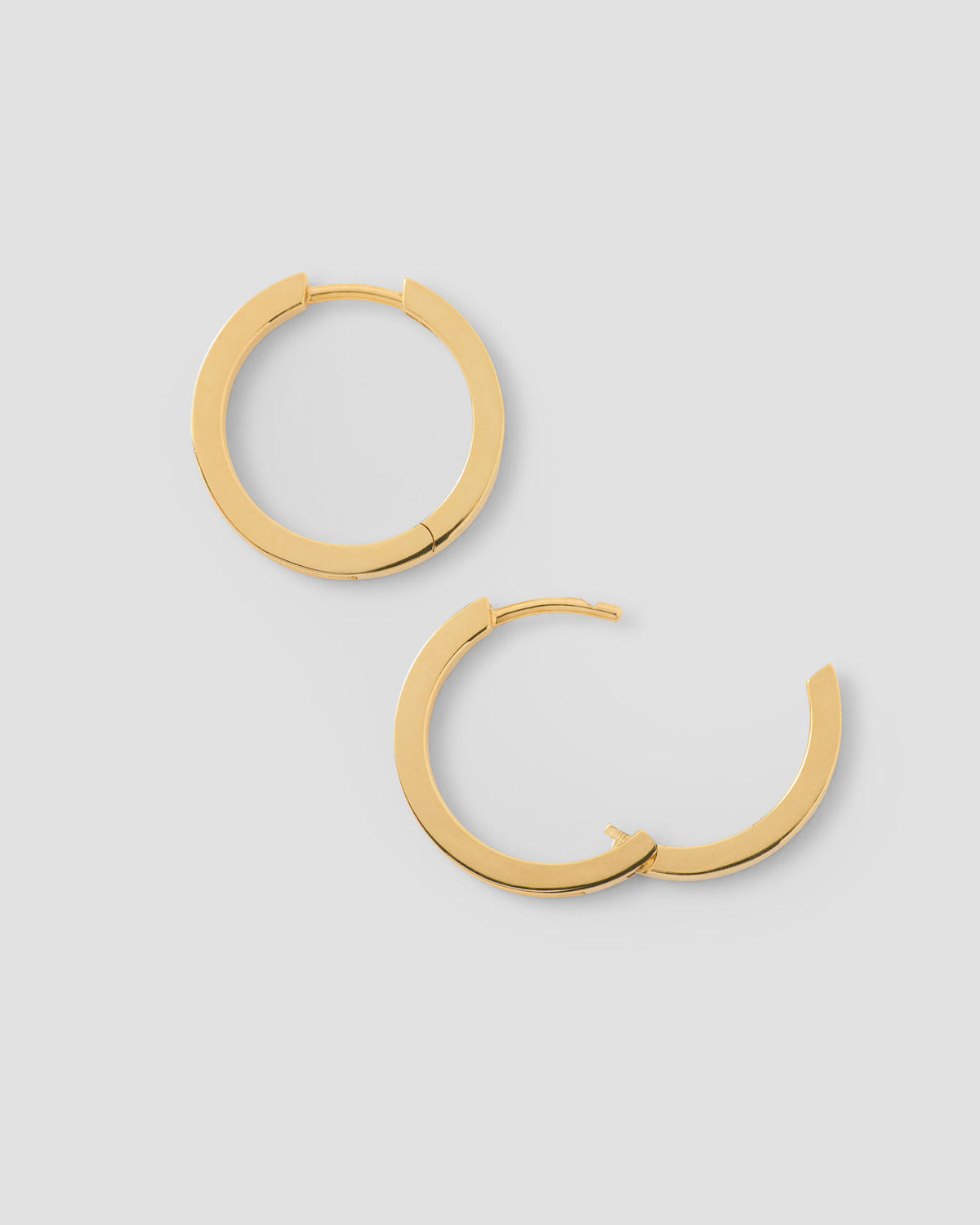 18k Huggie with Pavé Diamonds 18K gold earring - close-up detail | diamond huggie earrings