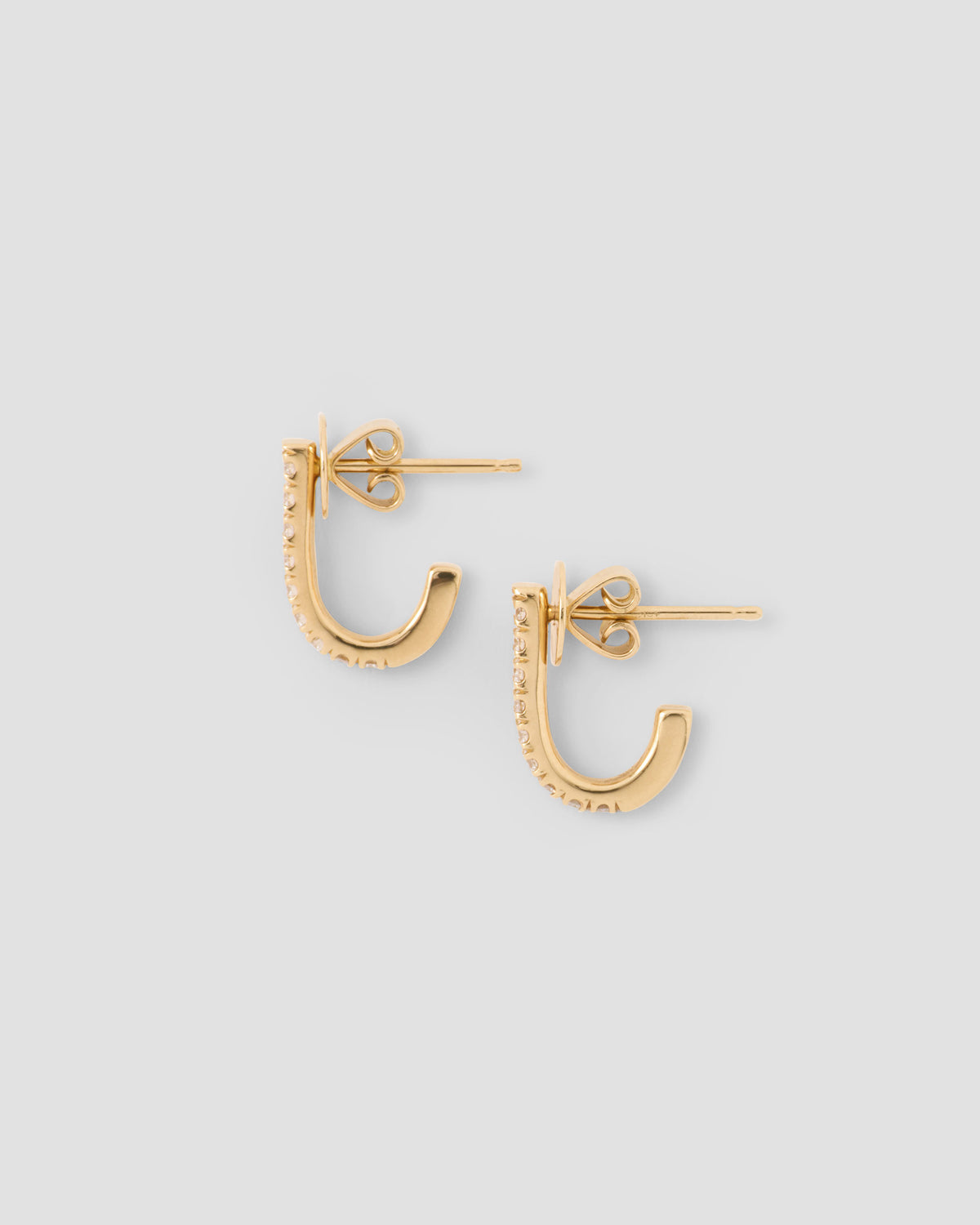 Small Pavé Diamond Level Earring in 18K Yellow gold earring - styled on model | diamond huggie earrings