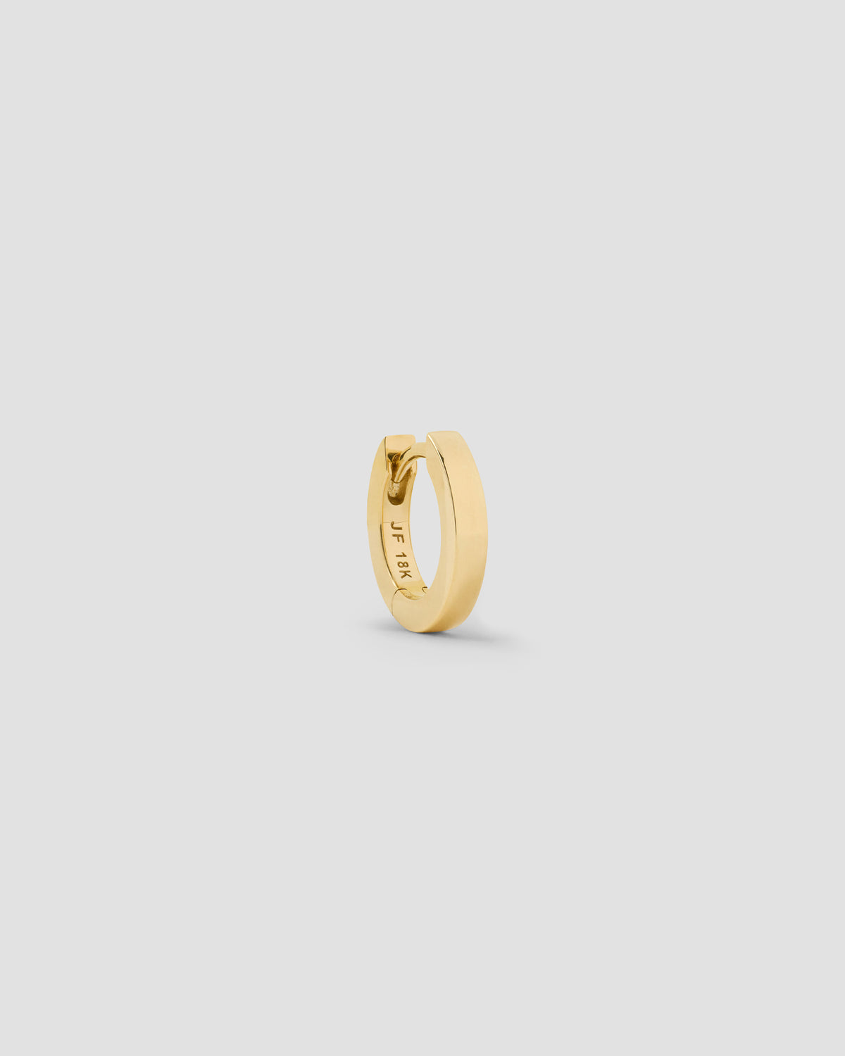 18k Extra Small Huggie earring - styled on model | gold huggie earrings