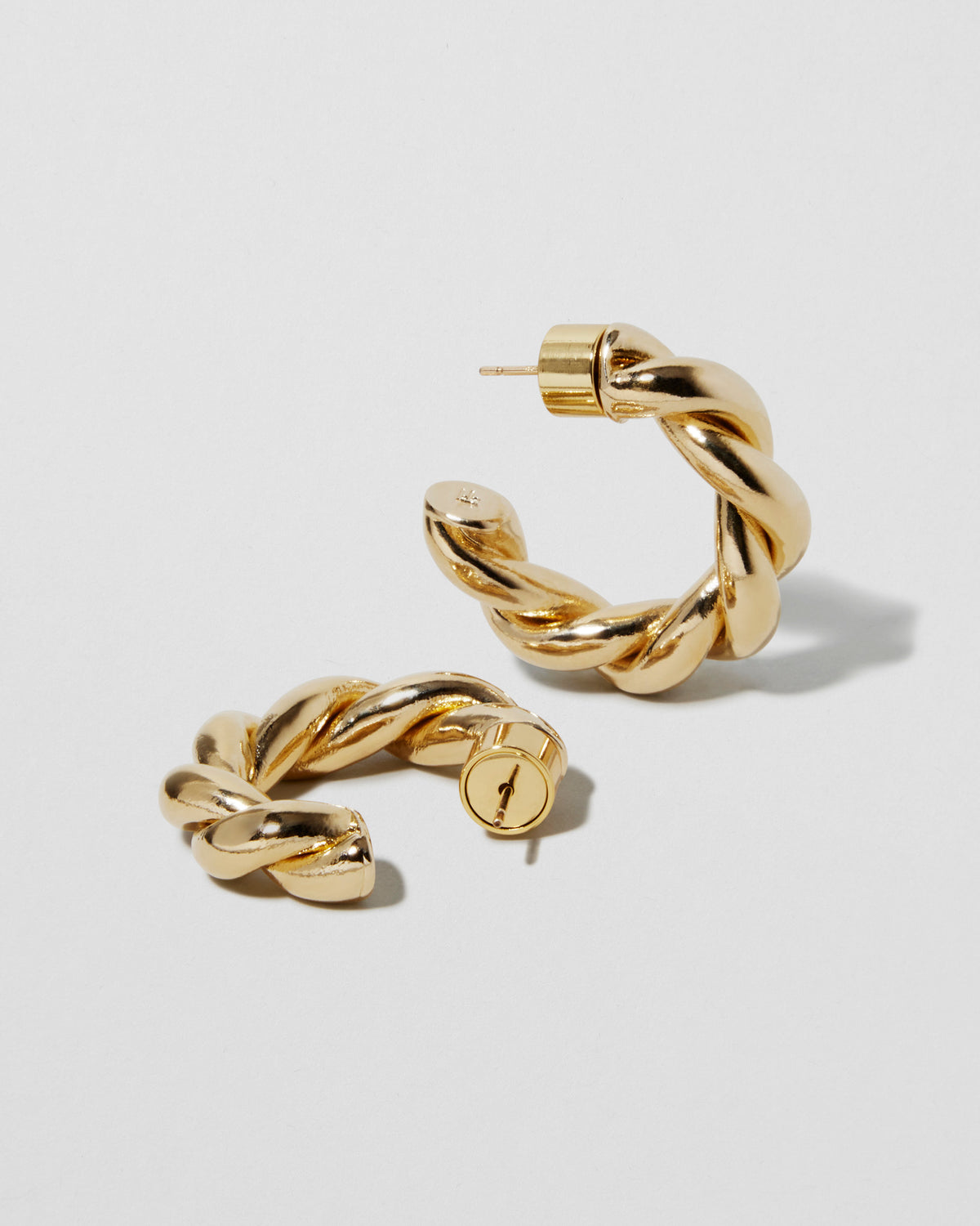 Twisted Lilly Huggies earring - close-up detail | gold huggie earrings