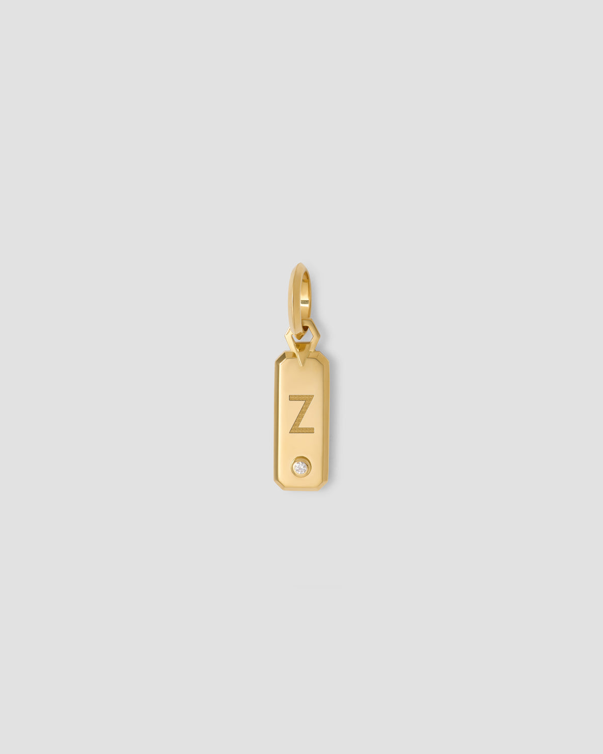 Minimal Block Letter Dog Tag in 18K Yellow gold charm - side view | necklace with charms