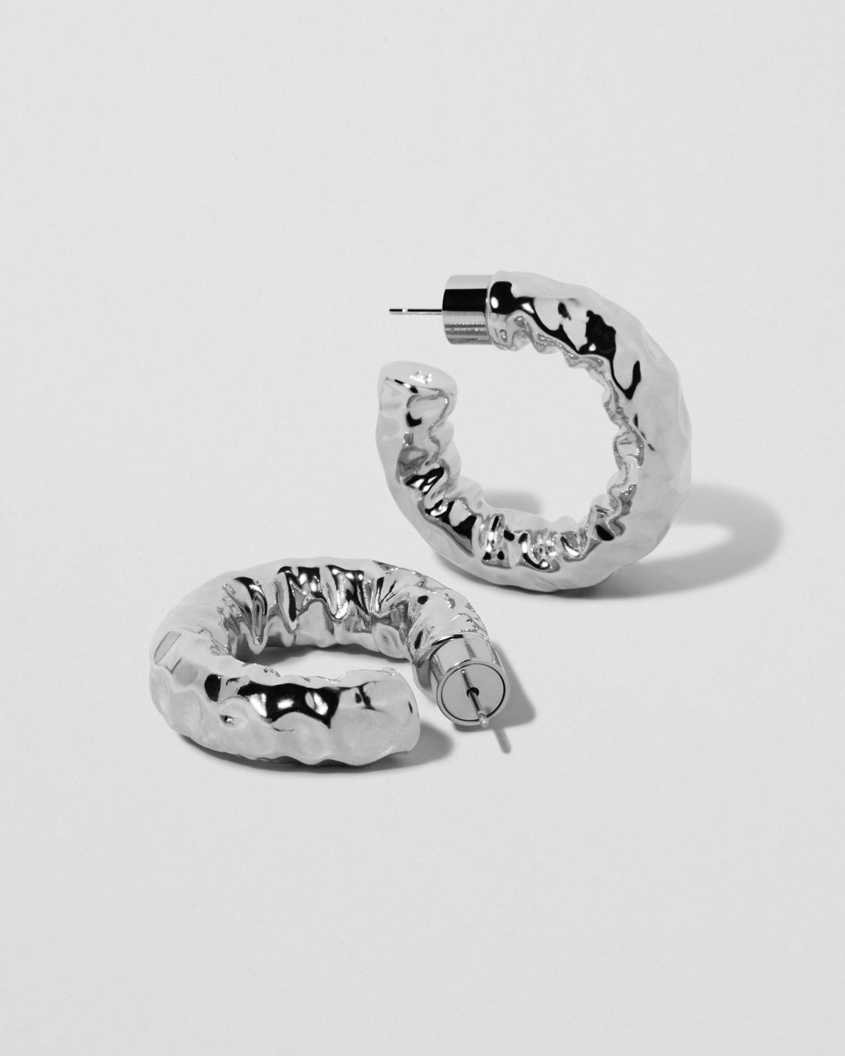 Maeve Huggies earring - close-up detail | gold huggie earrings